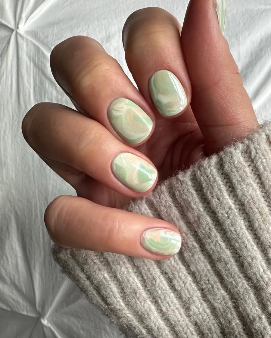 Chic marbled matcha-inspired nail art design