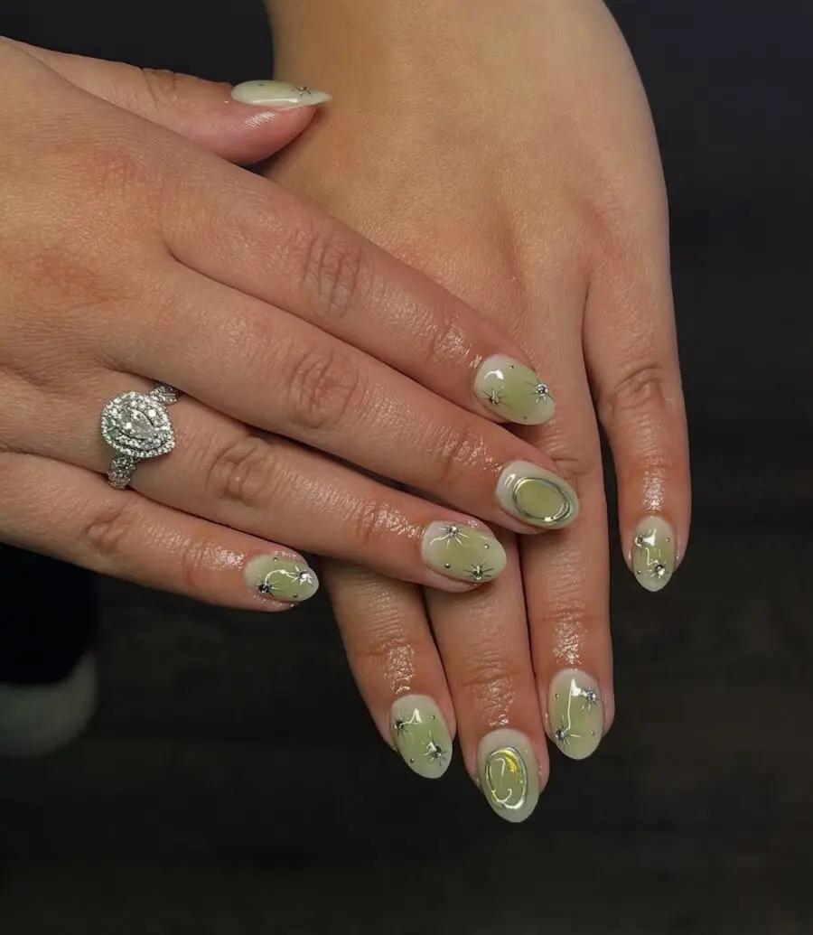 Trendy matcha nails with playful designs