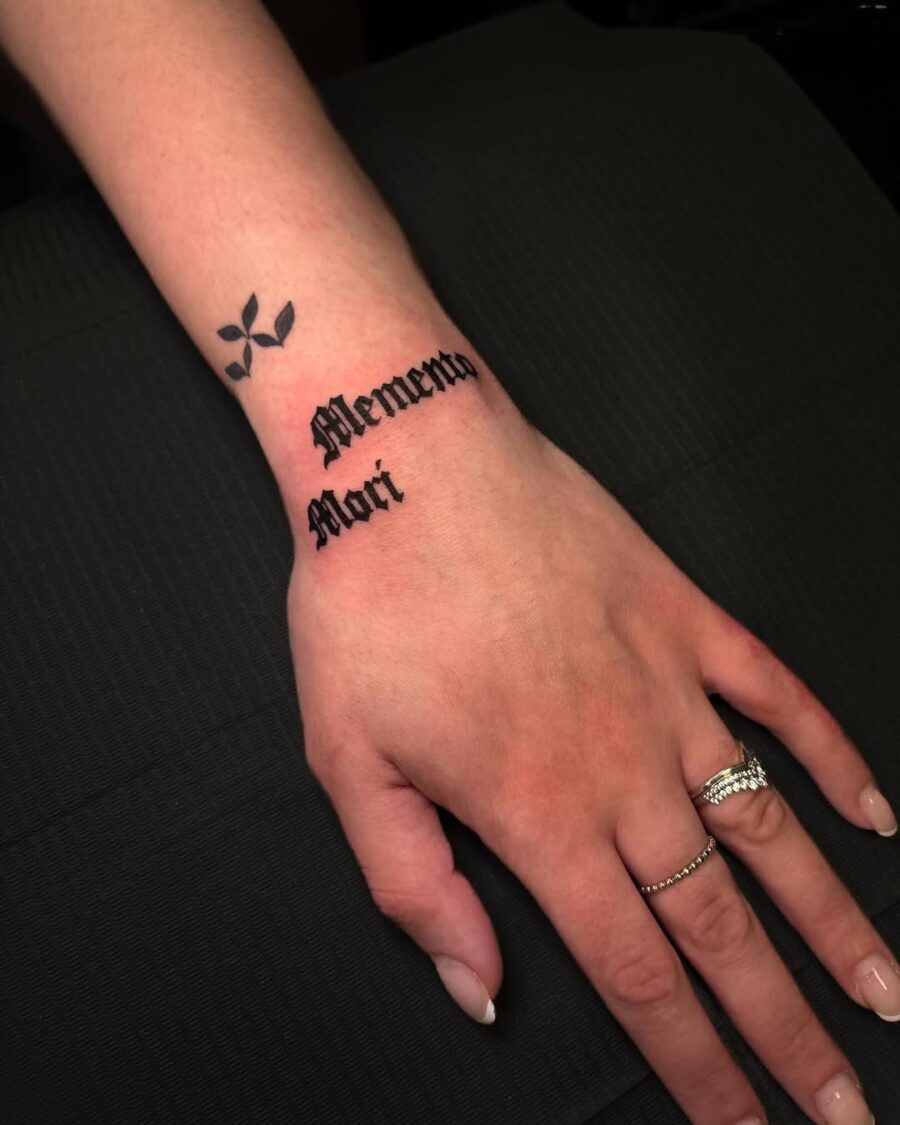 Thoughtful tattoo combining words and nature elements