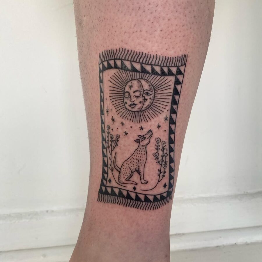 Coyote tattoo inspired by the sun and moon