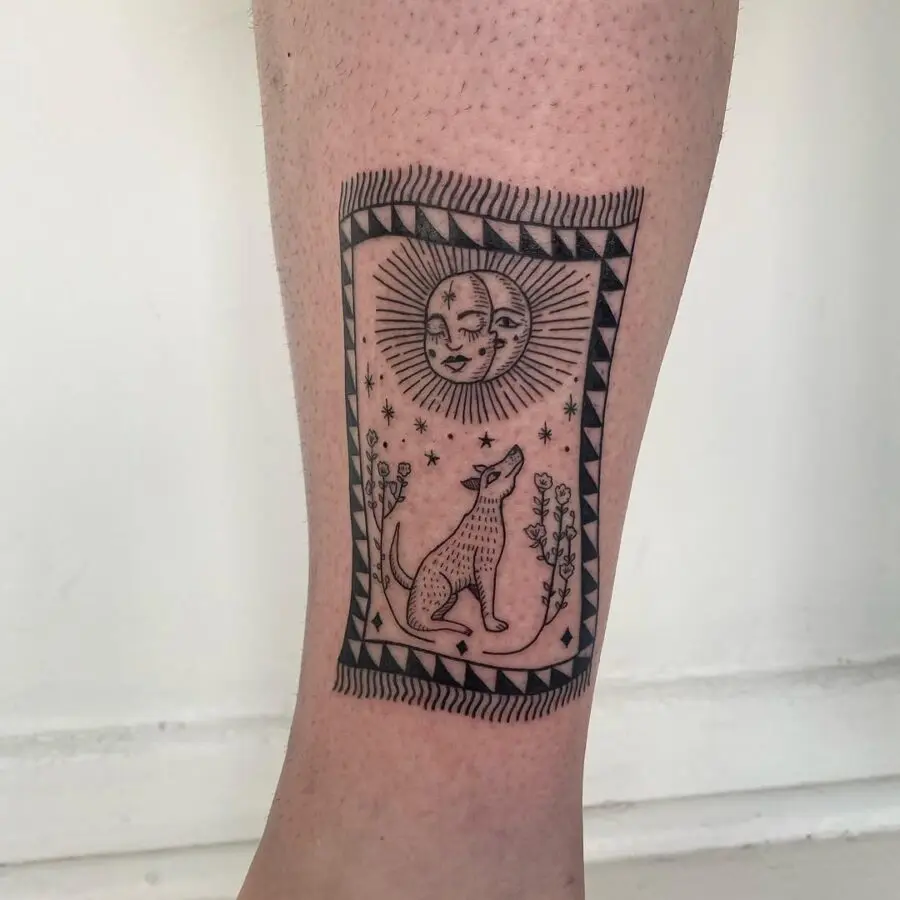 Coyote tattoo inspired by the sun and moon