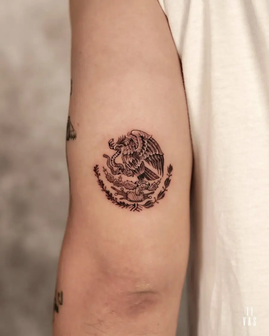 Symbolic Mexican tattoo featuring eagle and snake