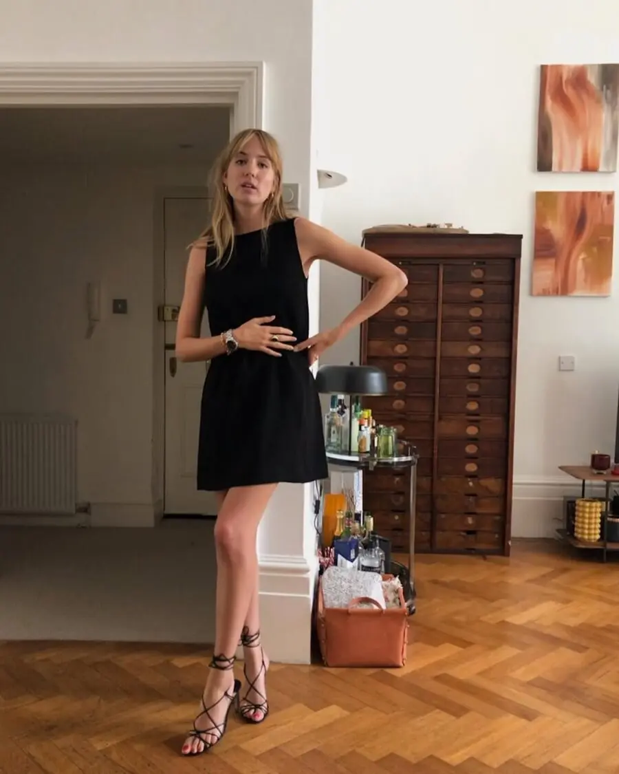 Chic black mini dress outfit for casual settings