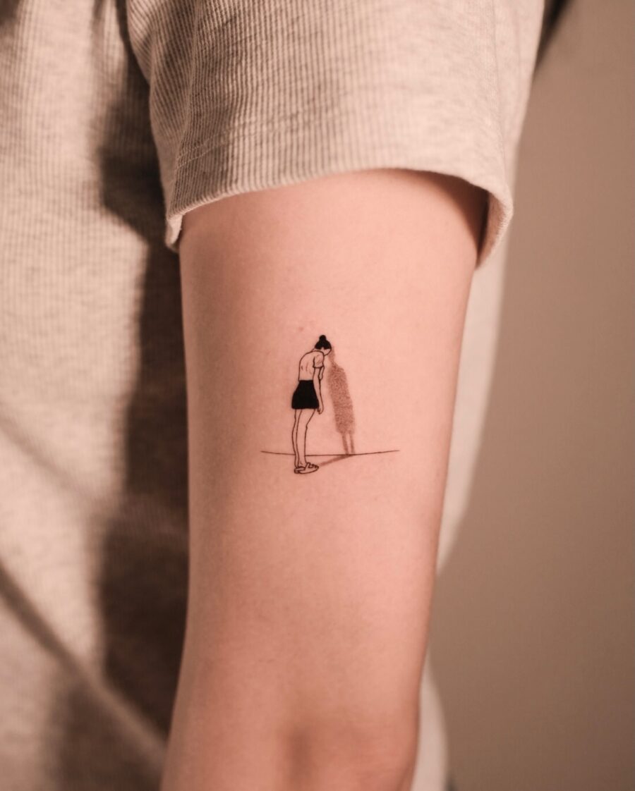 Artful silhouette of a contemplative girl tattoo
