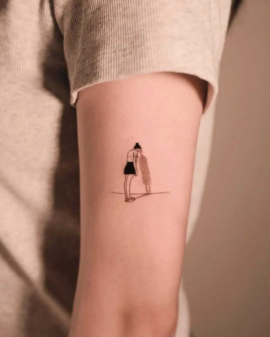 Artful silhouette of a contemplative girl tattoo