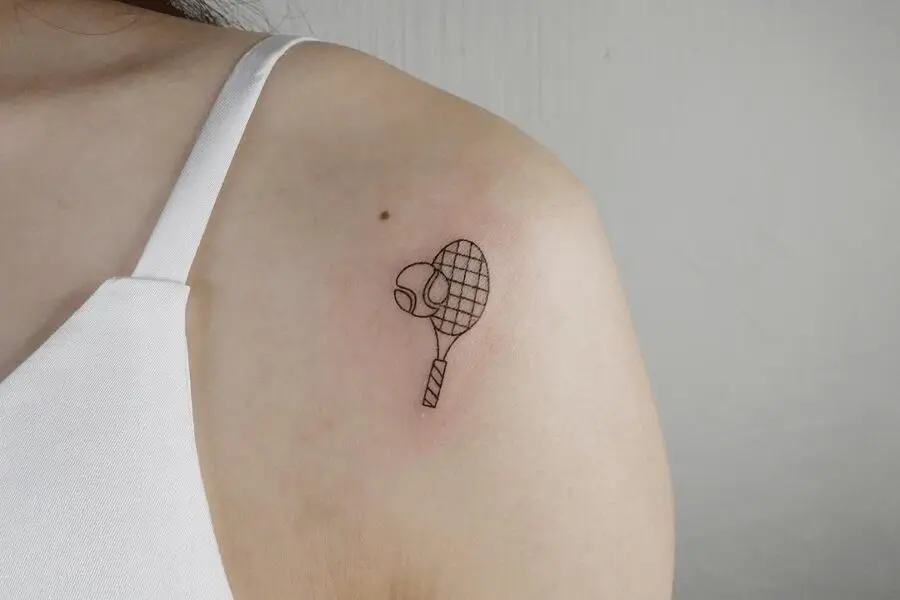 Stylish tennis racket and ball tattoo design