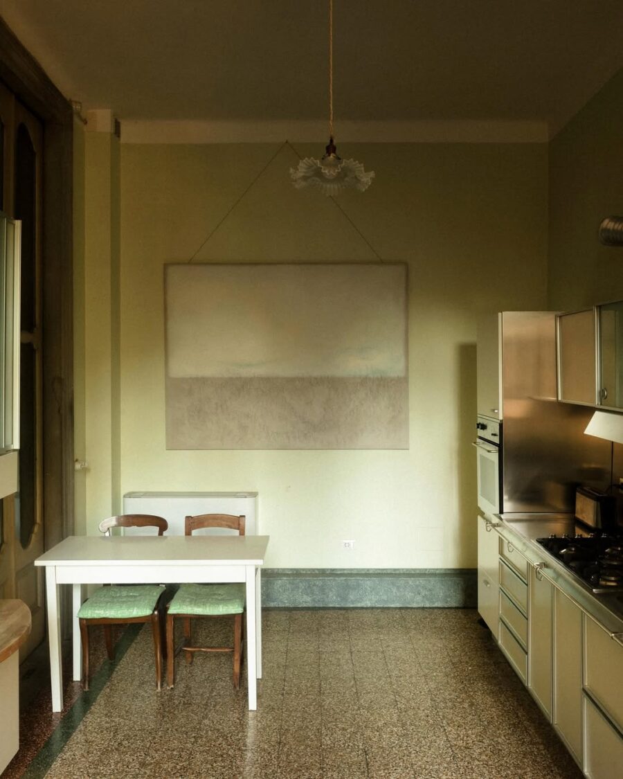Chic minimalist kitchen with serene artwork