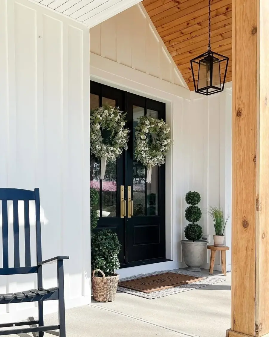 Charming porch with elegant greenery accents
