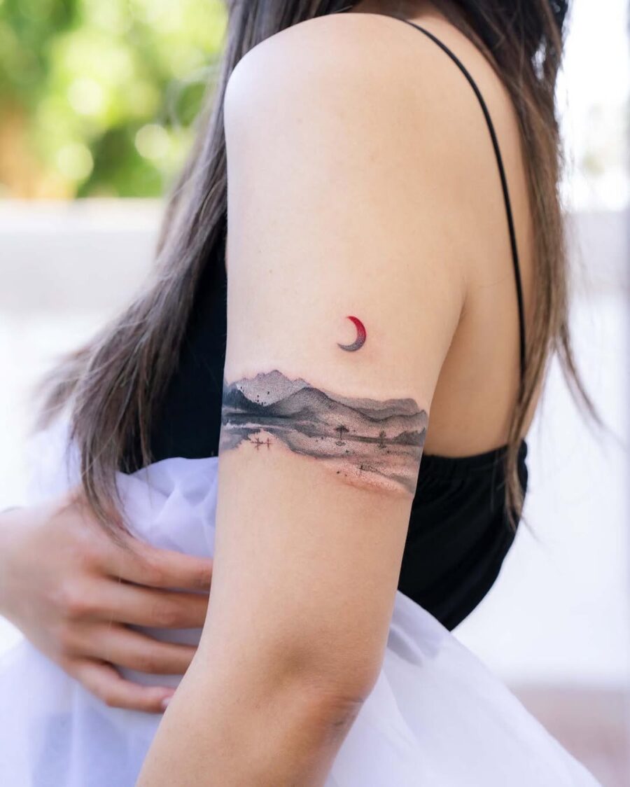 Stunning mountain and moon aesthetic tattoo