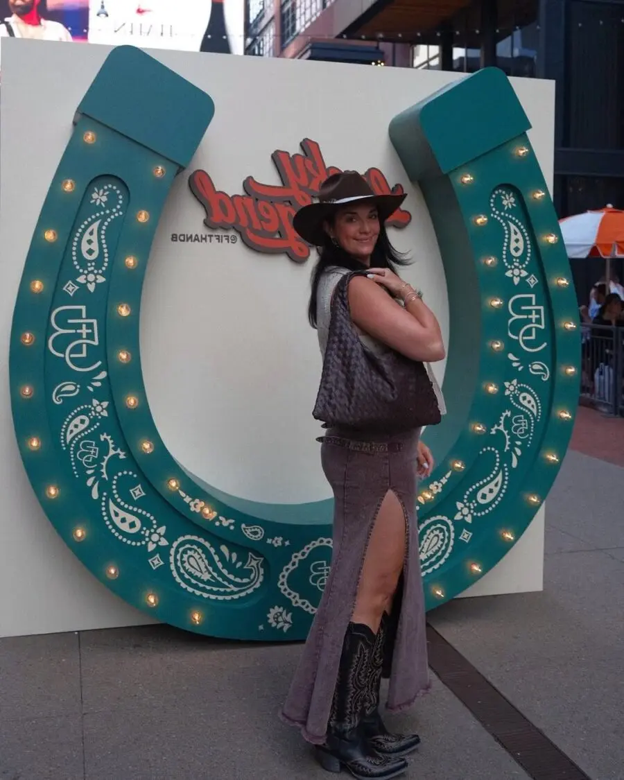 Chic Nashville Cowgirl Attire with Bold Accessories