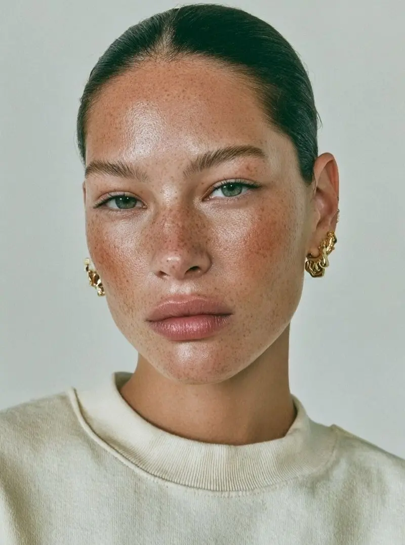 Effortless beauty with freckled, glowing skin