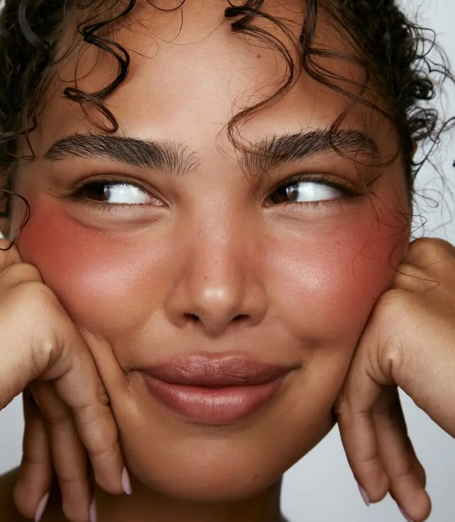 Effortless glow with rosy cheeks and soft lips