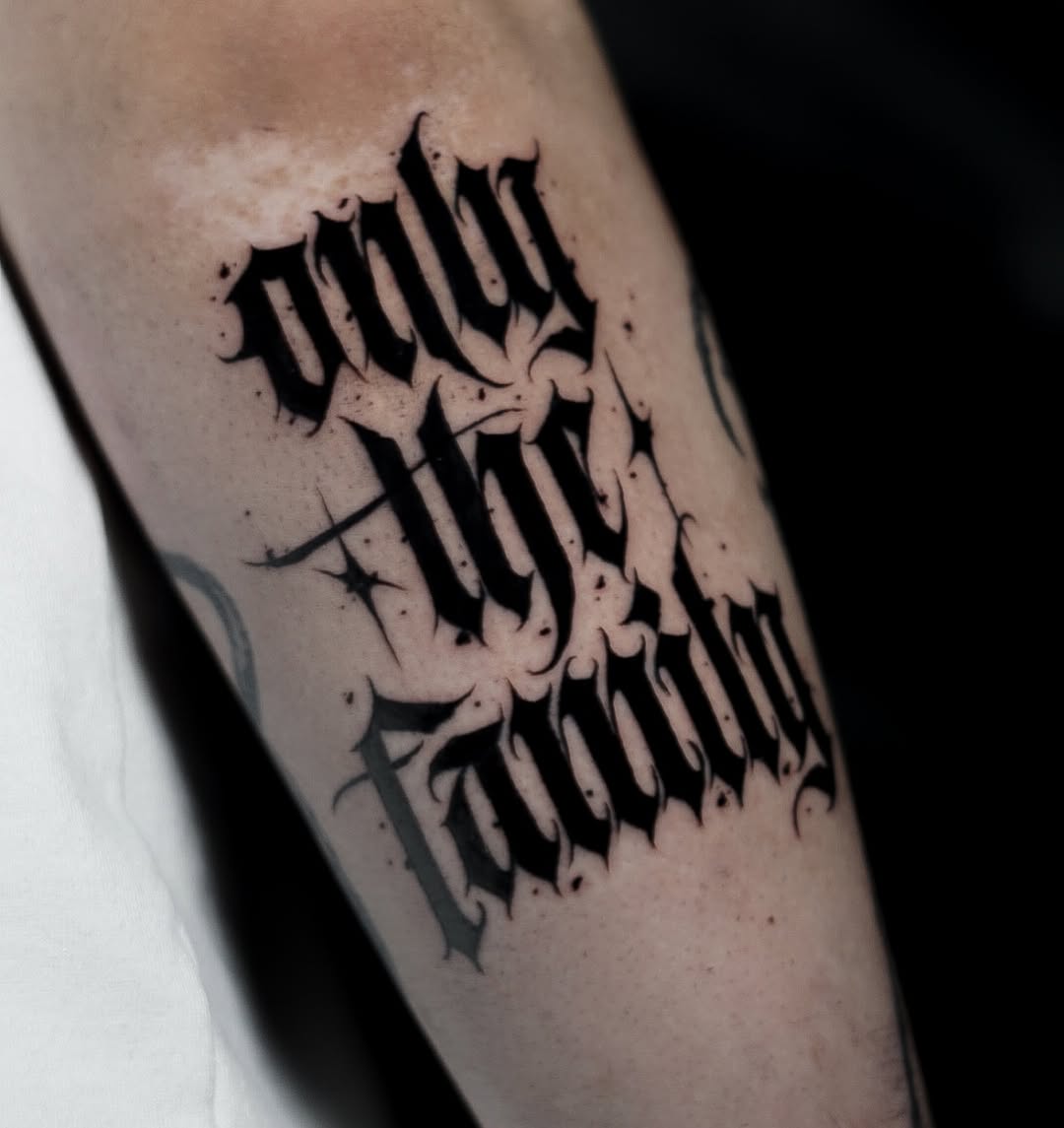 Stylish Blackletter Tattoo for Family Loyalty