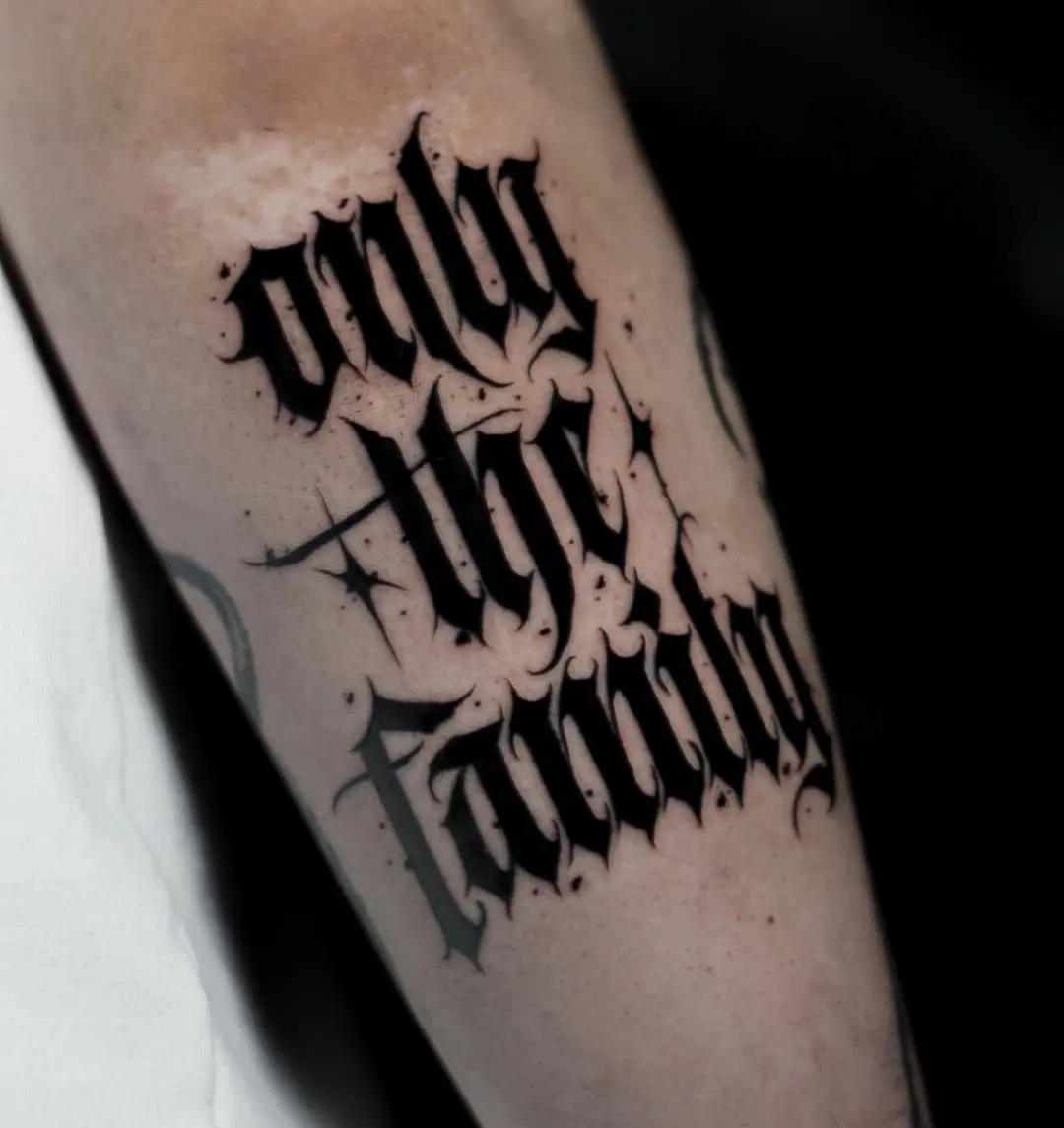 Stylish Blackletter Tattoo for Family Loyalty