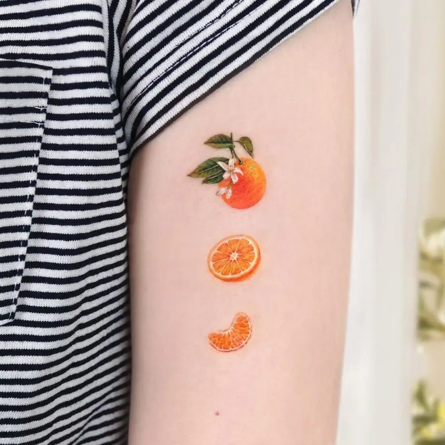 Charming and vibrant orange fruit tattoo collection