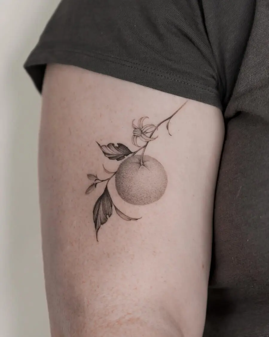 Stylish Orange Tattoo with Floral Accents