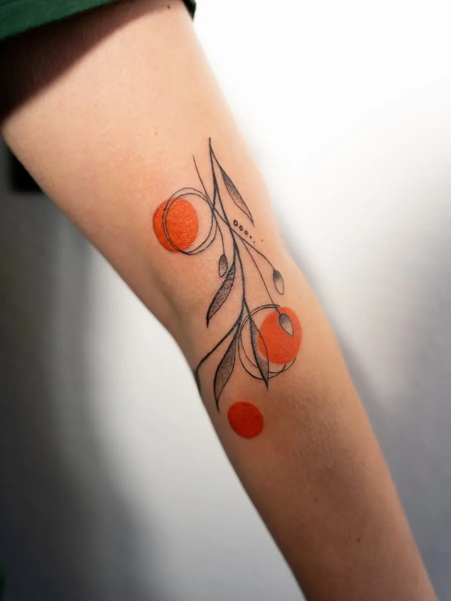 Stylish orange floral tattoo with abstract elements