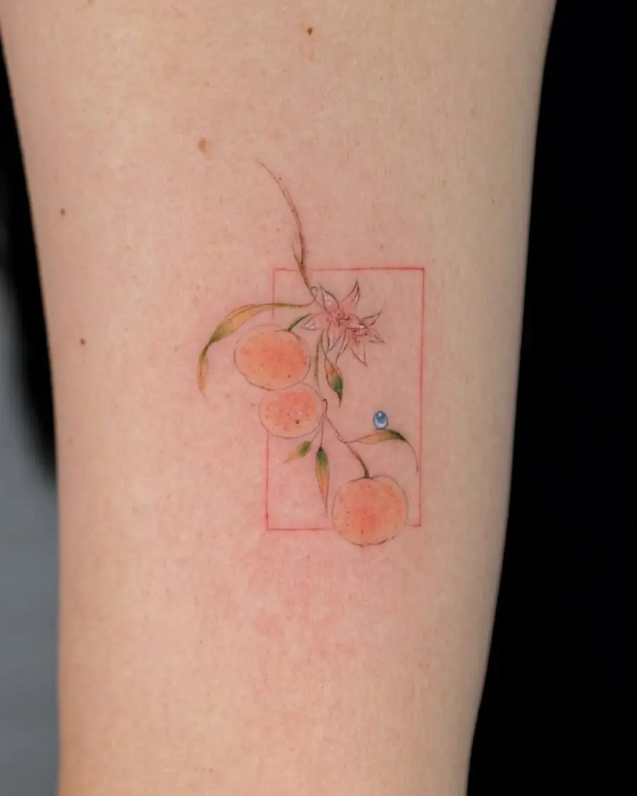 Charming orange tattoo with floral accents