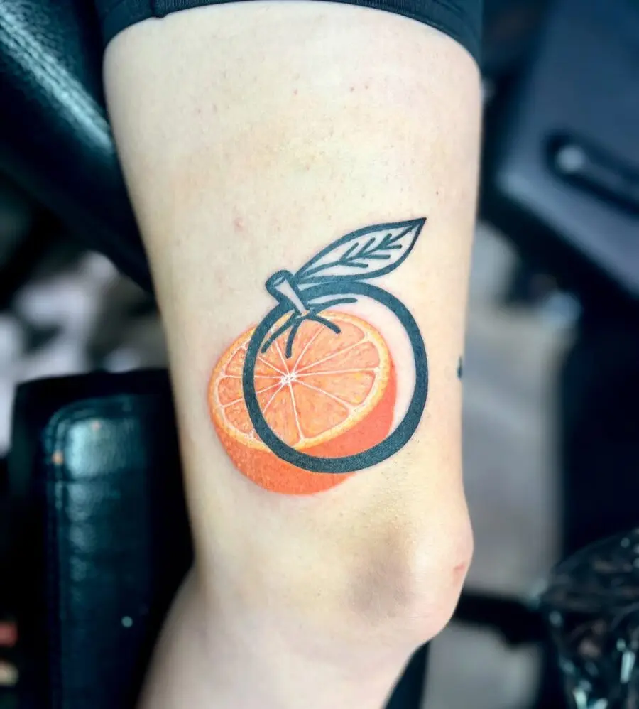 Bright orange tattoo with bold black outline