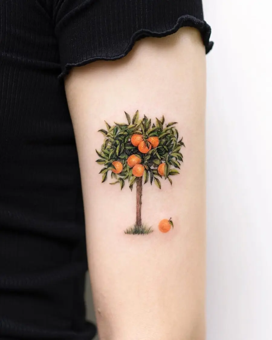 Vibrant Orange Tree Tattoo with Lush Foliage