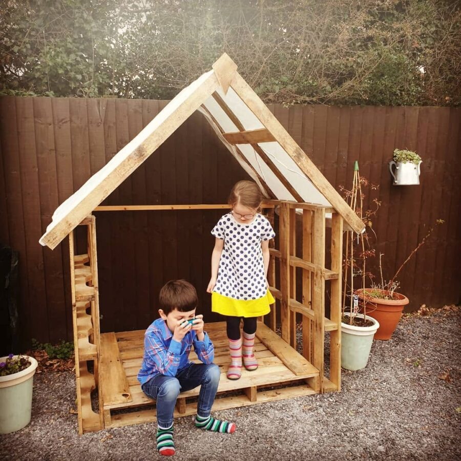 Creative pallet playhouse for kids' outdoor fun