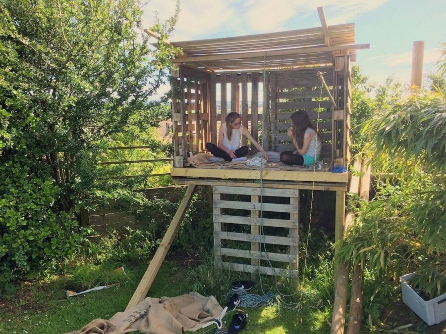 Charming pallet treehouse for hours of fun