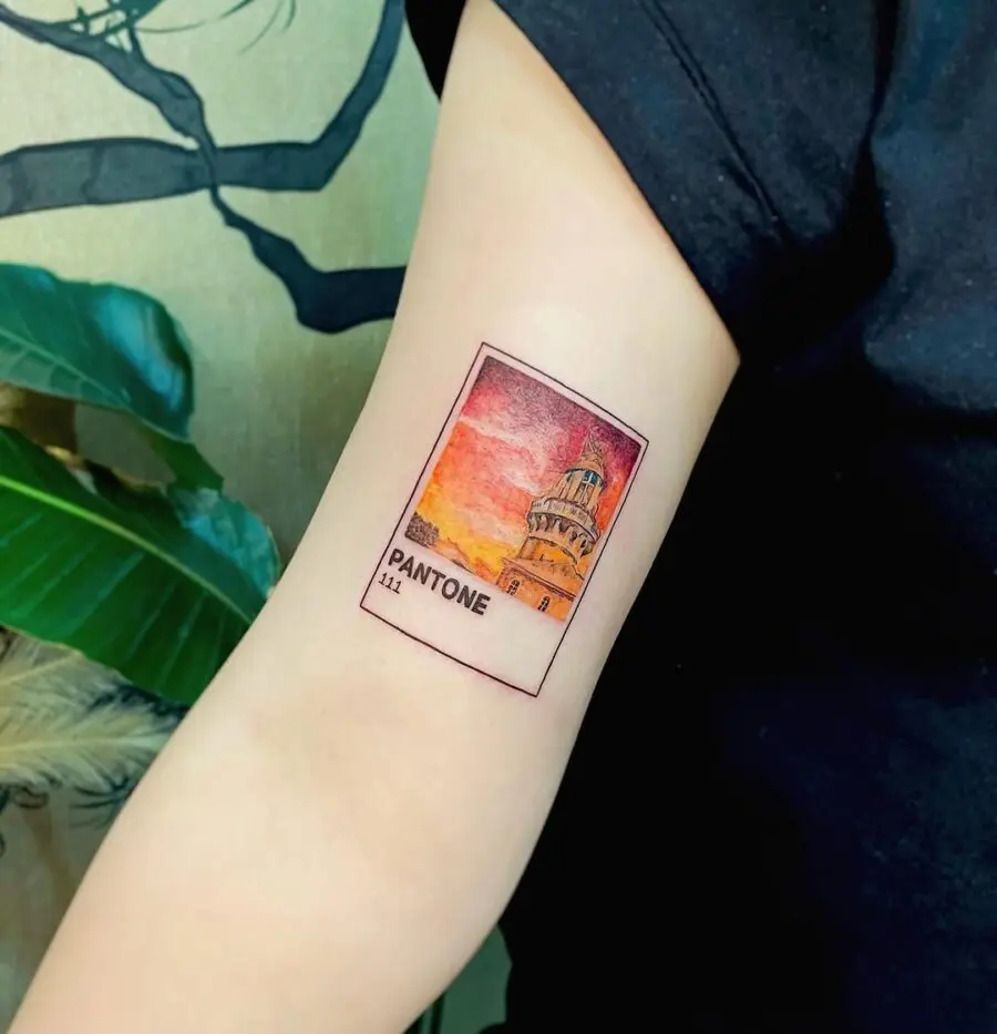 Vibrant Pantone Tattoo Featuring Iconic Landmark