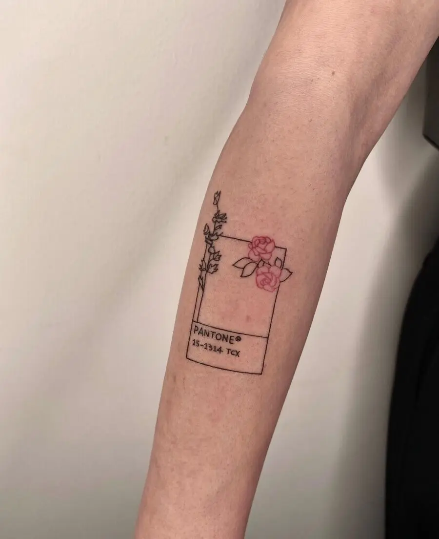 Charming Pantone tattoo with floral accents