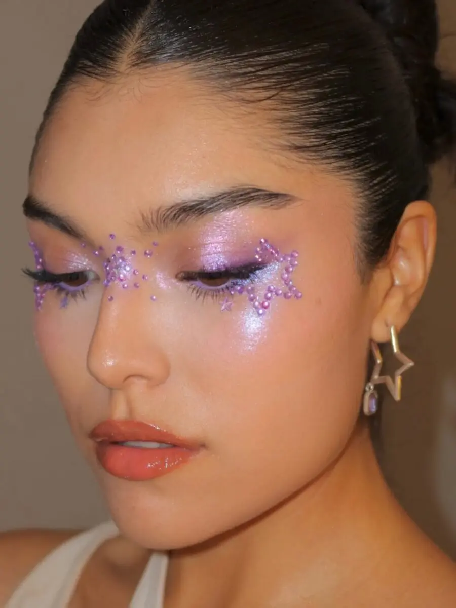 Sparkling Purple Party Makeup with Star Accents