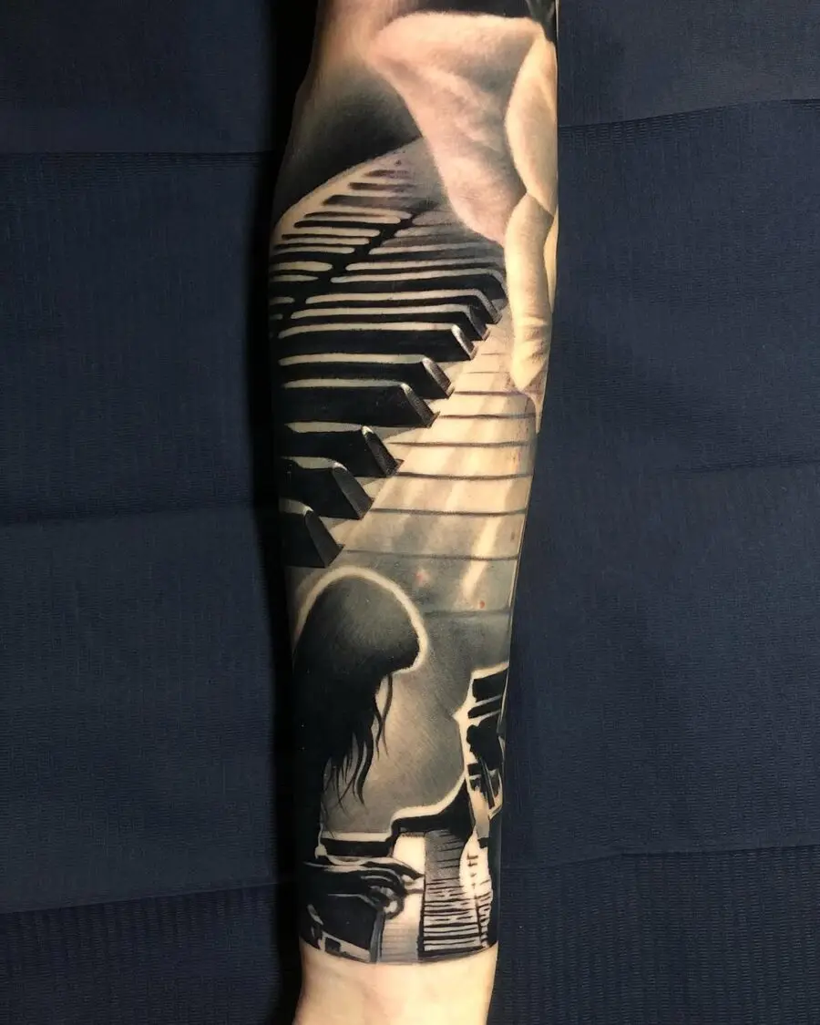 Intricate piano tattoo creating musical harmony