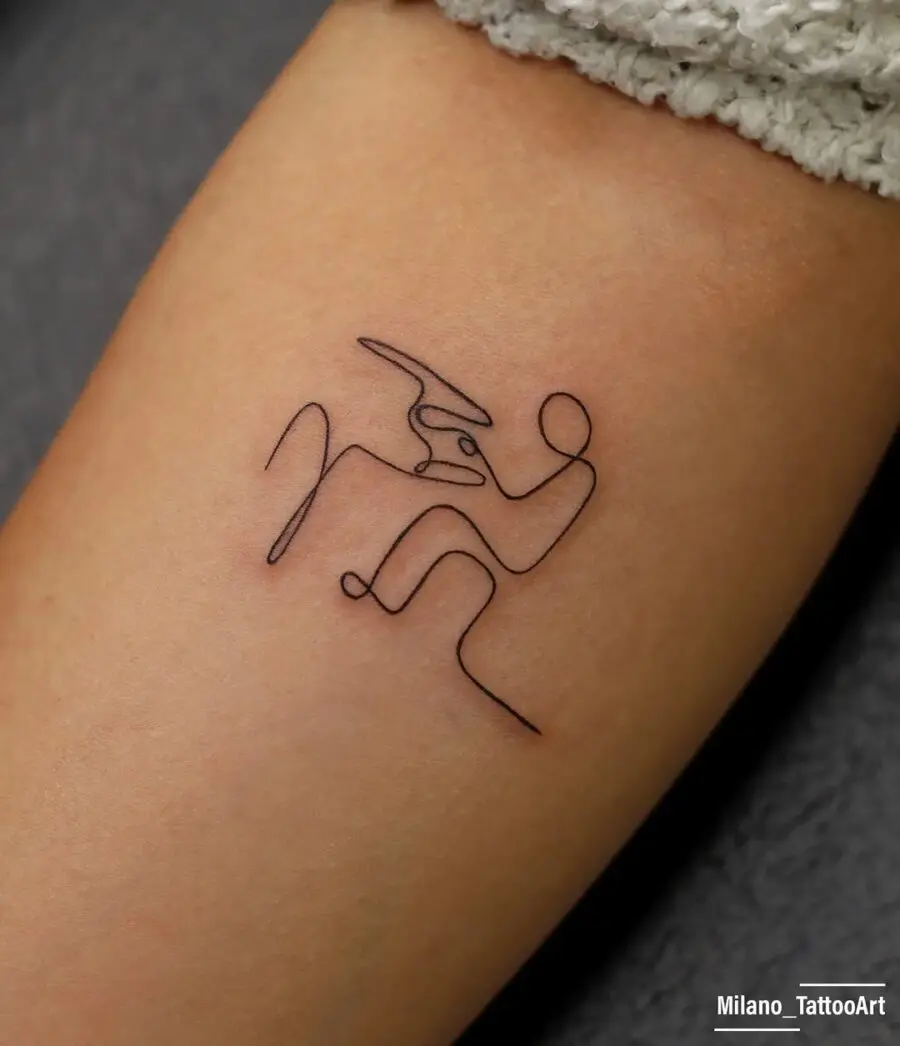 Elegant minimalistic piano line art tattoo