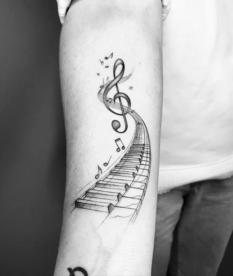 Elegant piano tattoo with musical flair