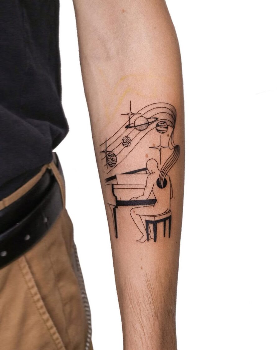 Elegant piano tattoo with musical elements
