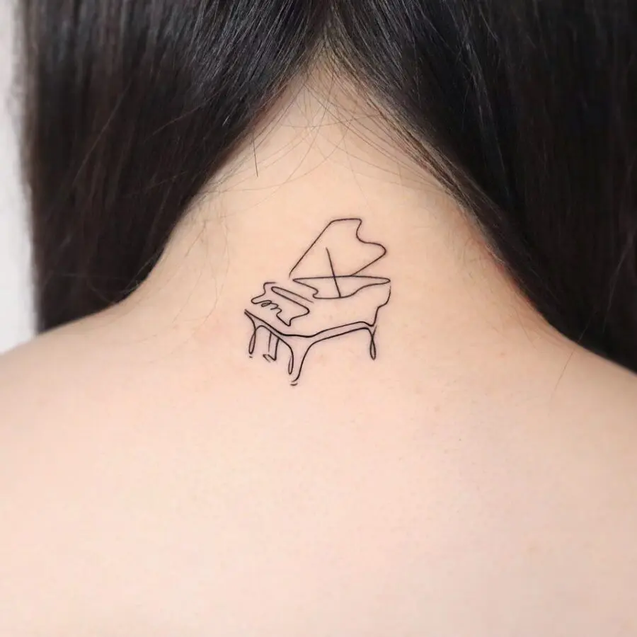 Elegant minimalist piano tattoo on the neck