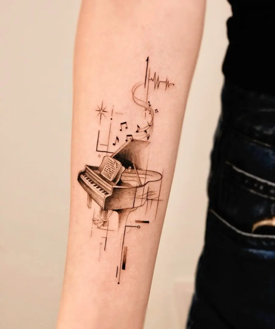 Elegantly crafted piano tattoo showcasing musical elements