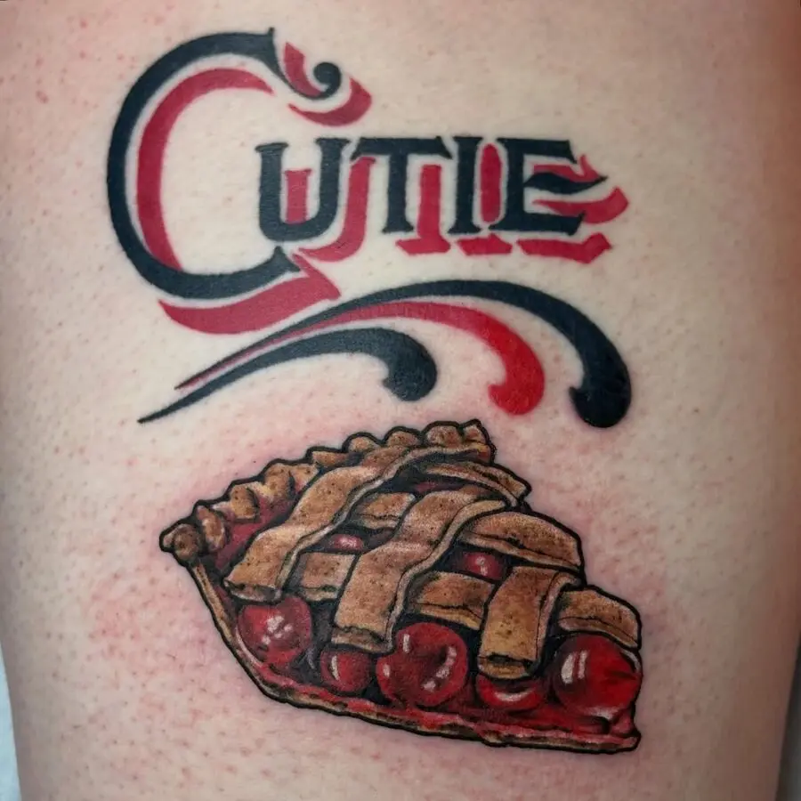 Playful pie tattoo with vibrant lettering