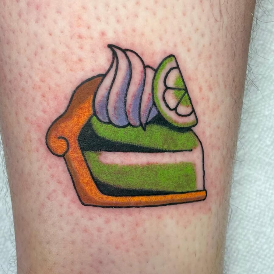 Vibrant lime pie tattoo with playful detailing