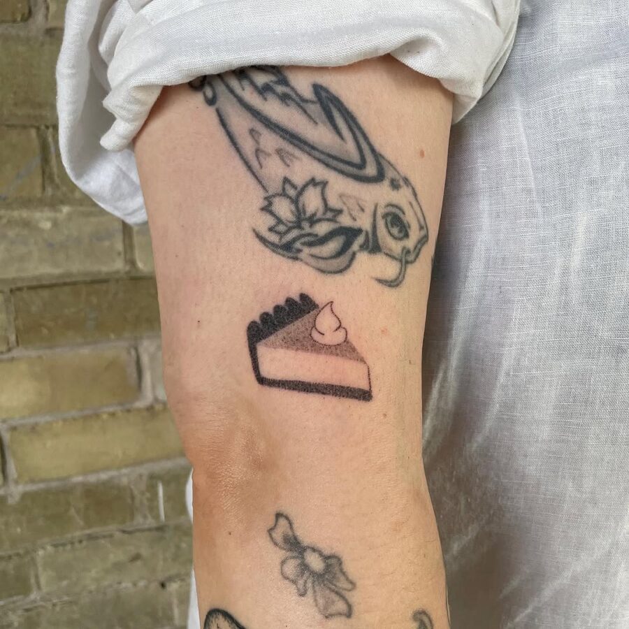 Charming slice of pie tattoo art