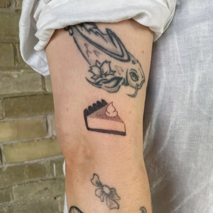 Charming slice of pie tattoo art