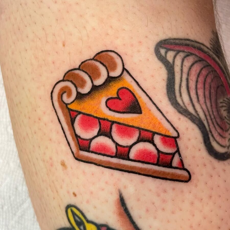 Sweet slice of pie tattoo with heart detail