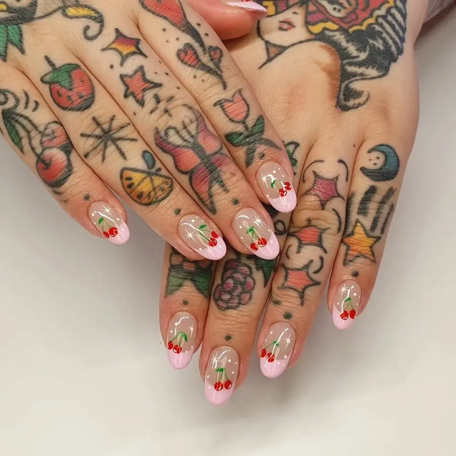 Chic pink French tips adorned with cherries