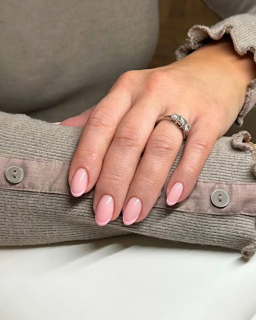 Elegant pink French tip nails for a chic look