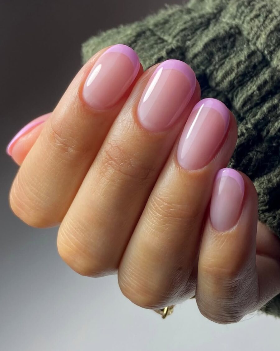 Chic pink French tip nails with a modern twist