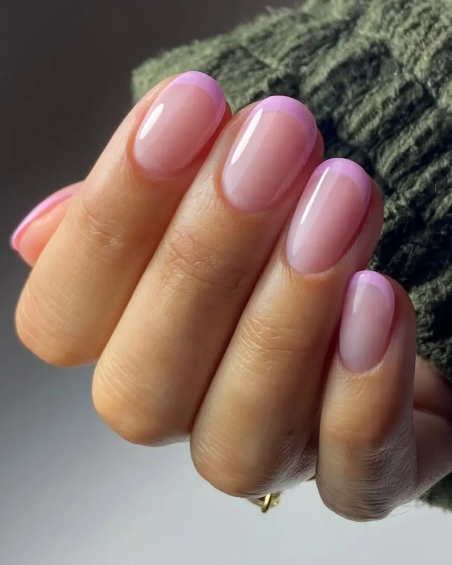 Chic pink French tip nails with a modern twist