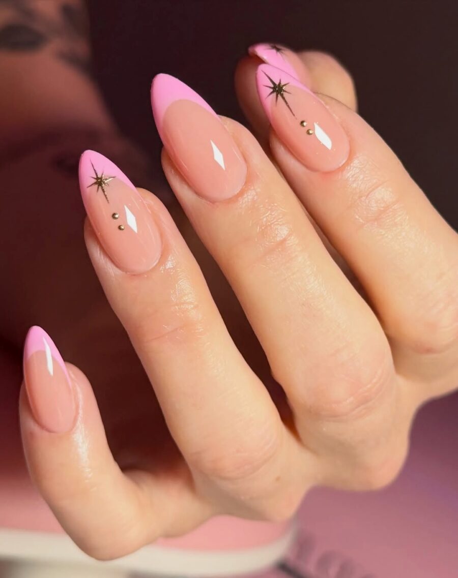 Chic pink French tip nails with star accents
