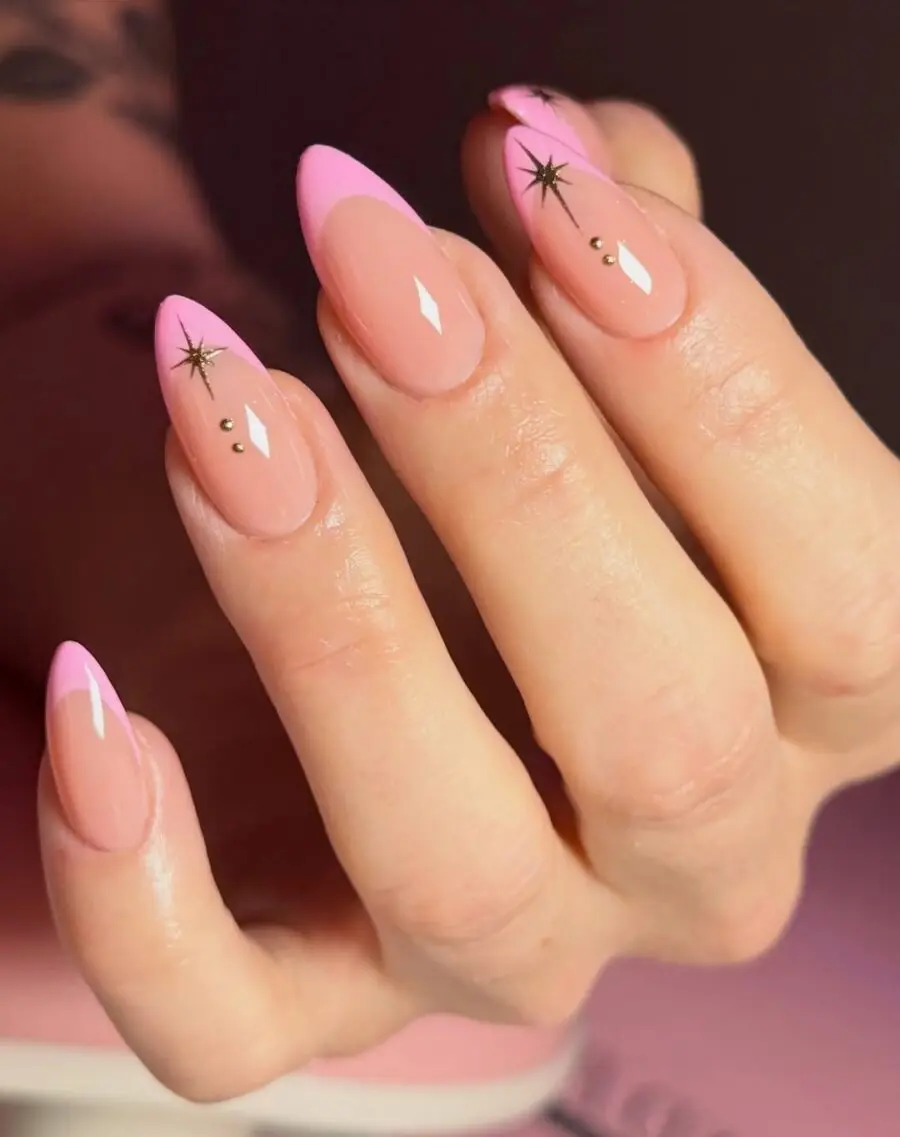 Chic pink French tip nails with star accents