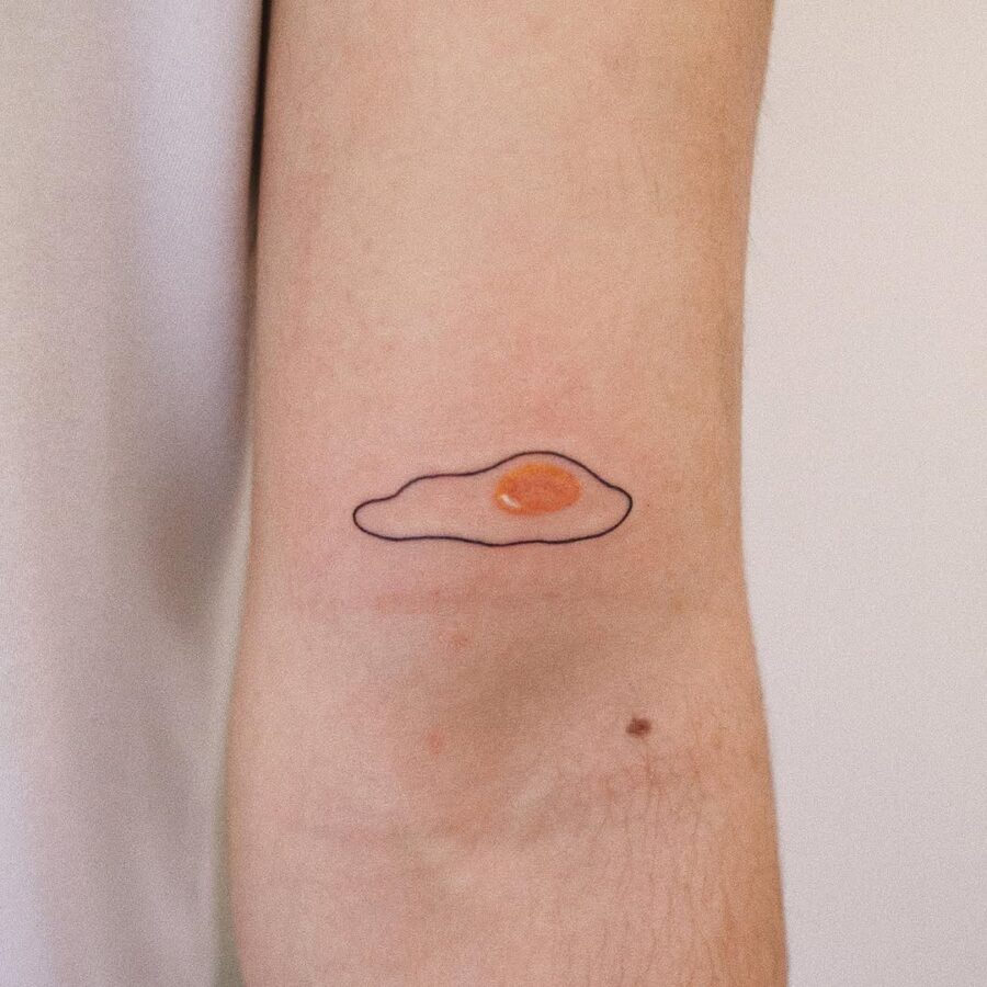 Charming and whimsical egg tattoo design concept