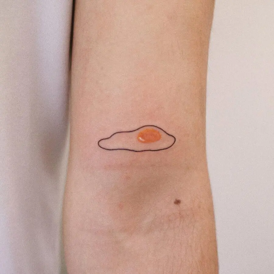 Charming and whimsical egg tattoo design concept