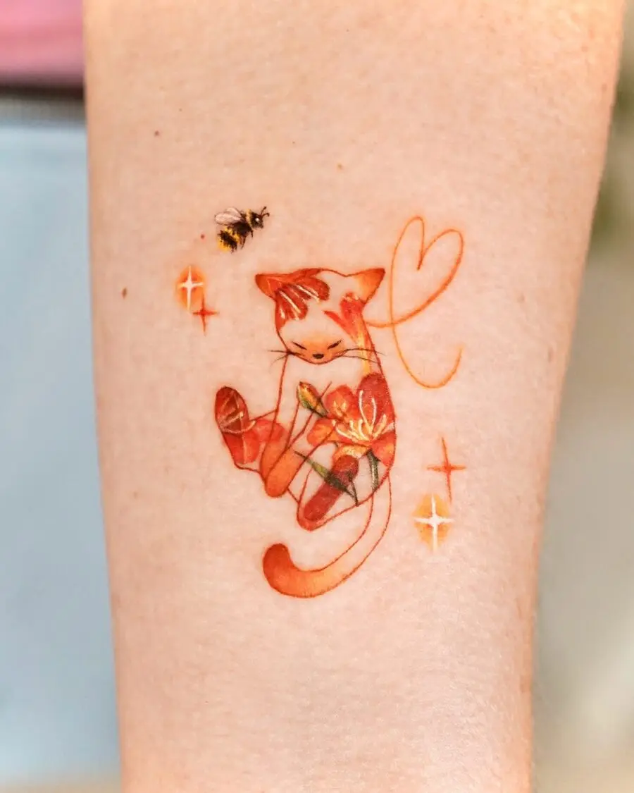 Adorable orange cat tattoo with floral accents