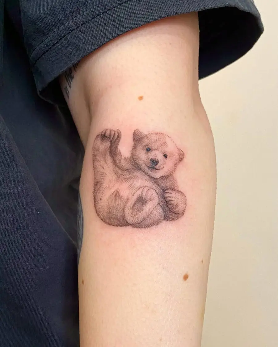 Adorable polar bear tattoo showcasing playful spirit
